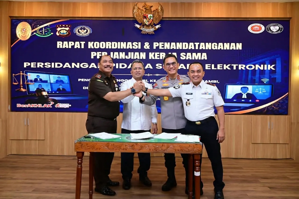 Gemini_Generated_Image_vv8aazvv8aazvv8a - BERITA POLRI INDEPENDEN INVESTIGASI Polda Jambi Perkuat Sinergi Aparat Penegak Hukum melalui Persidangan Pidana Secara Elektronik